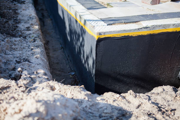 Professional Waterproofing technician working in Forestville, WI